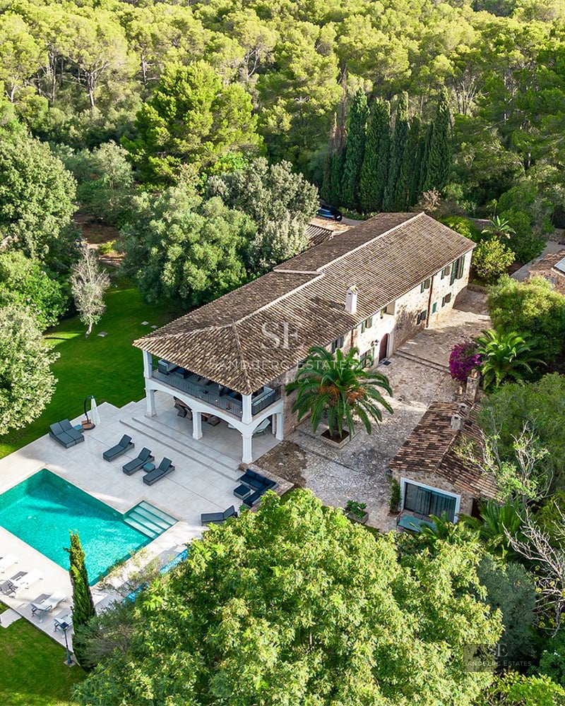 Spacious terrace with pool, sun loungers, and panoramic views. Modern design with glass railings and light-colored flooring.