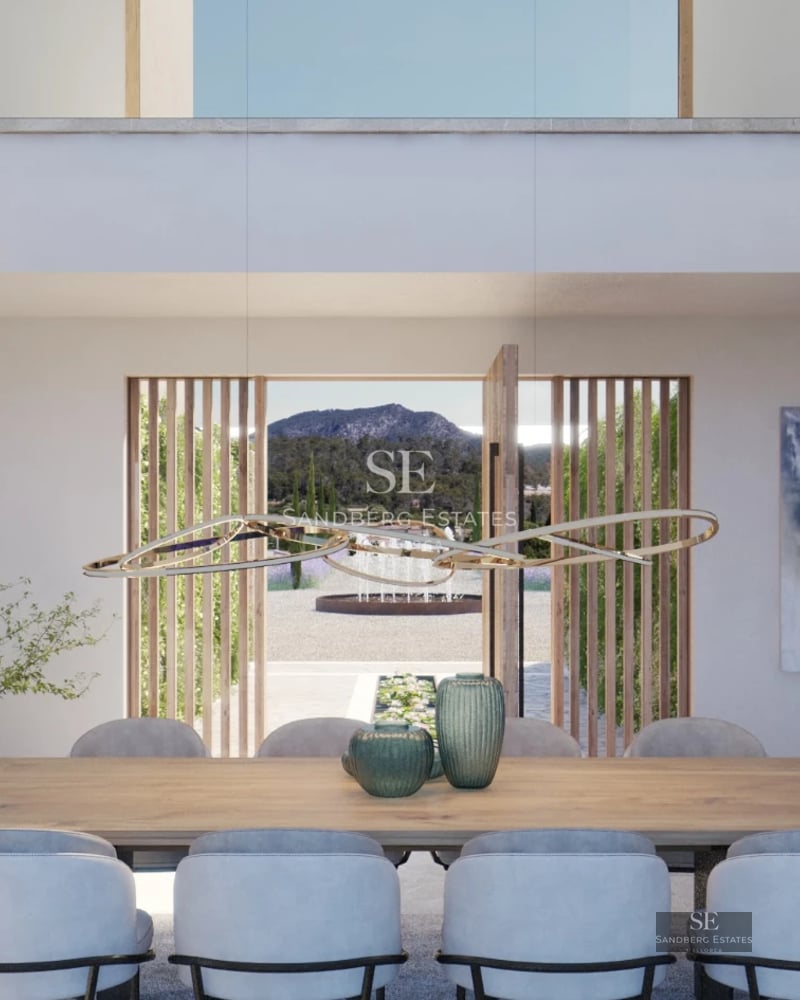 Spacious living room featuring floor-to-ceiling windows, designer sofas, modern coffee table, and terrace access with panoramic views. Elegance and comfort.