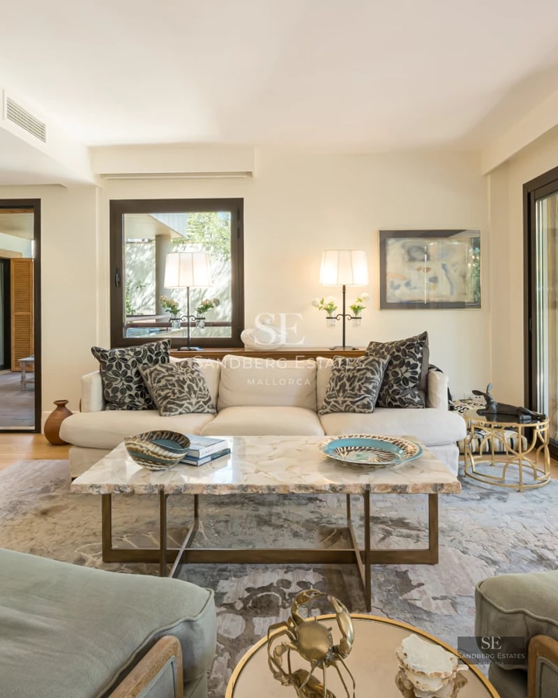 Spacious terrace with infinity pool, sun loungers, and panoramic views. Modern, elegant architecture. Relaxing and luxurious atmosphere.