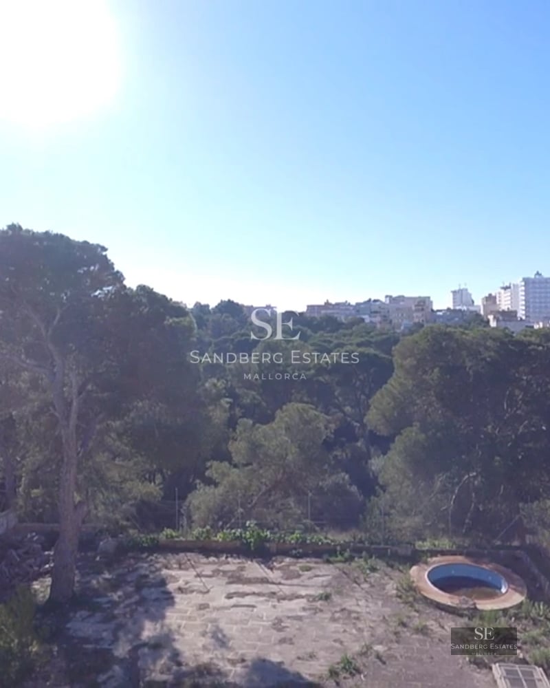 Exterior view of a modern villa with reflecting pool, expansive windows and minimalist landscaping. Soft ambient lighting.
