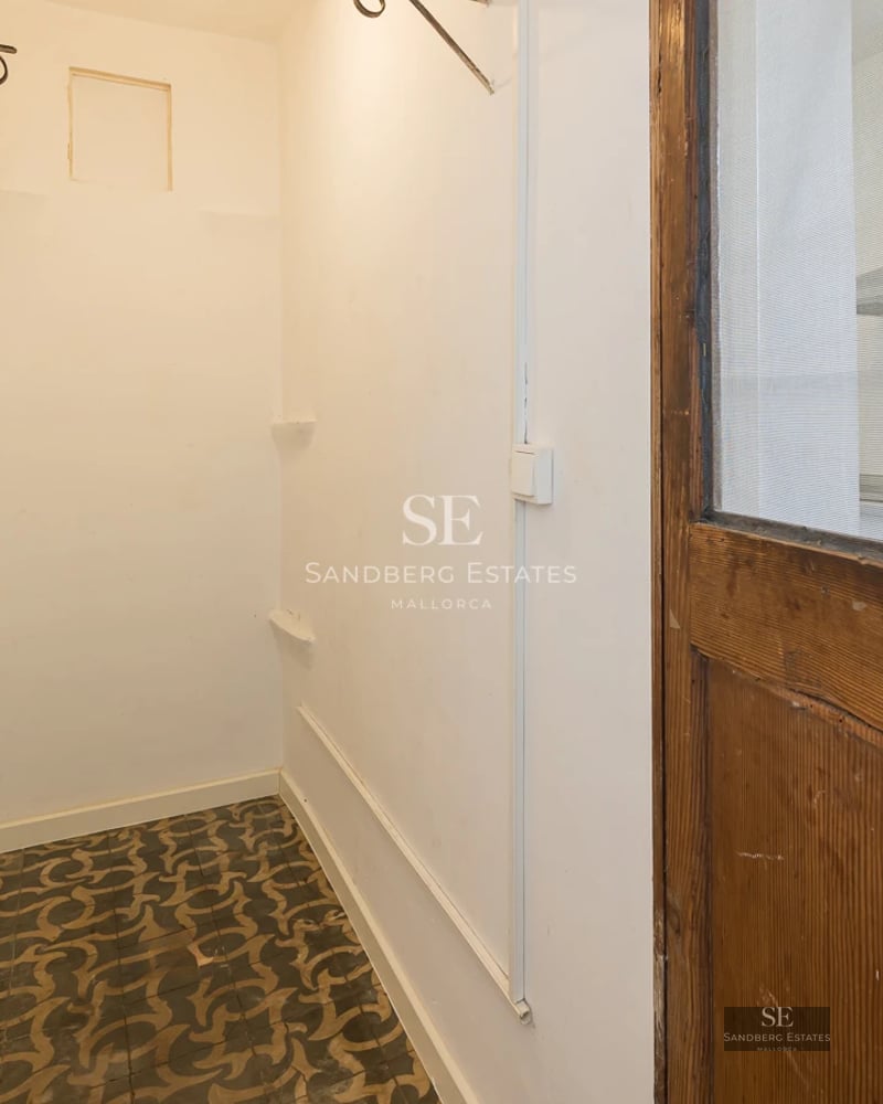 Exterior of a modern villa with reflective pool, manicured garden, and minimalist architecture. Warm lighting and clear sky.