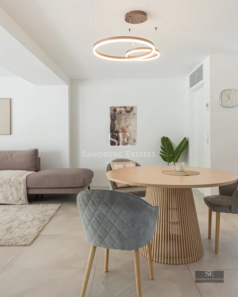 Spacious balcony with panoramic sea views. Modern and elegant furniture. Glass railing maximizing the view.