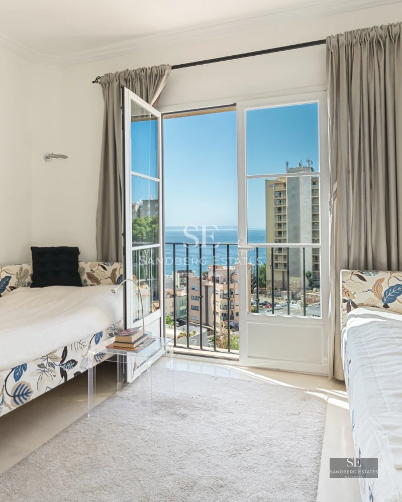 Spacious terrace with infinity pool, sun loungers, and panoramic sea views. Modern design with natural materials and abundant natural light.