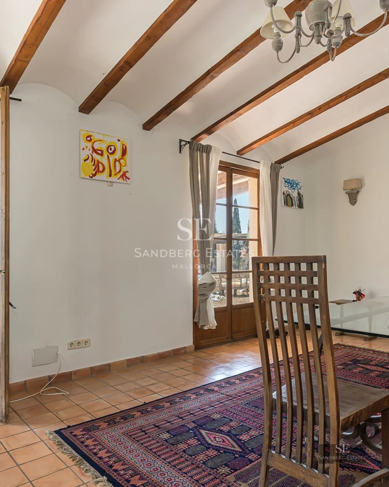 Spacious terrace with panoramic sea views. Modern and elegant outdoor furniture. Private pool and lush greenery.