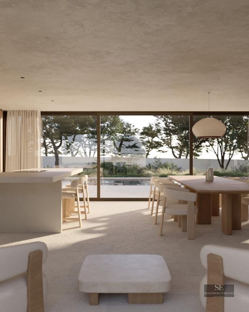 Large modern open-concept room with kitchen, dining table, and lounge area featuring floor-to-ceiling windows to a pool.