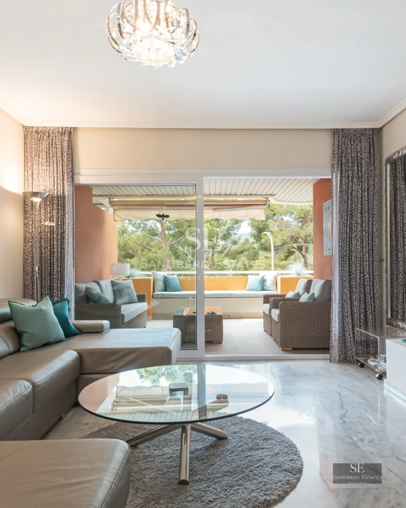 Stunning view of modern villa with infinity pool. Sleek design, spacious terraces, lush gardens, and panoramic views.