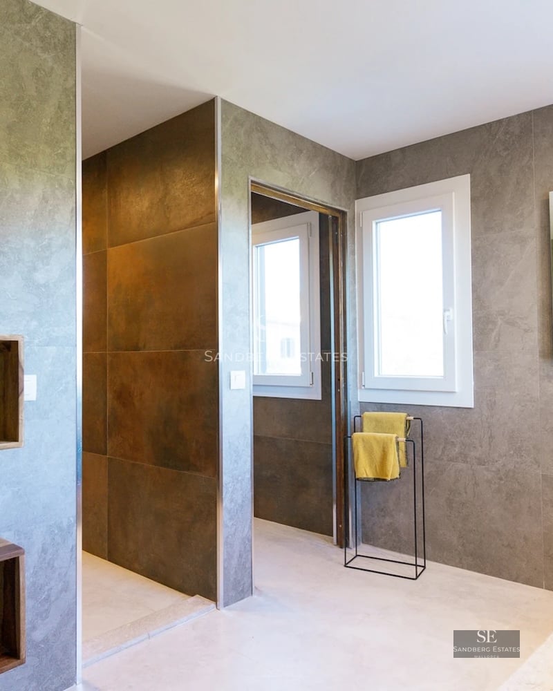 Spacious terrace with panoramic views. Modern and elegant furniture. Ideal for relaxation and outdoor entertaining.