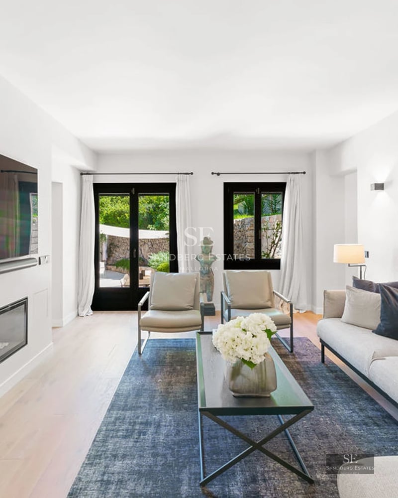 View of modern villa with pool, large windows, and garden. Minimalist architecture, elegant design, and high-quality finishes.