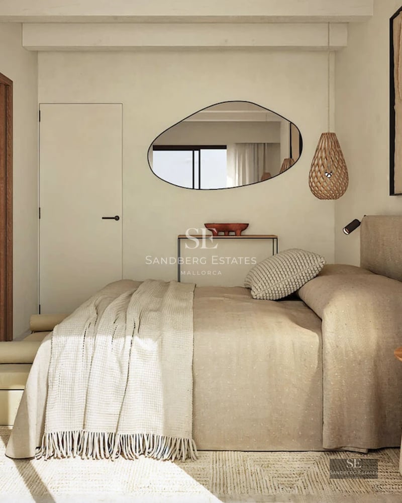 Pool view with lounge chairs and lush garden. Modern architecture with large windows and surrounding vegetation.