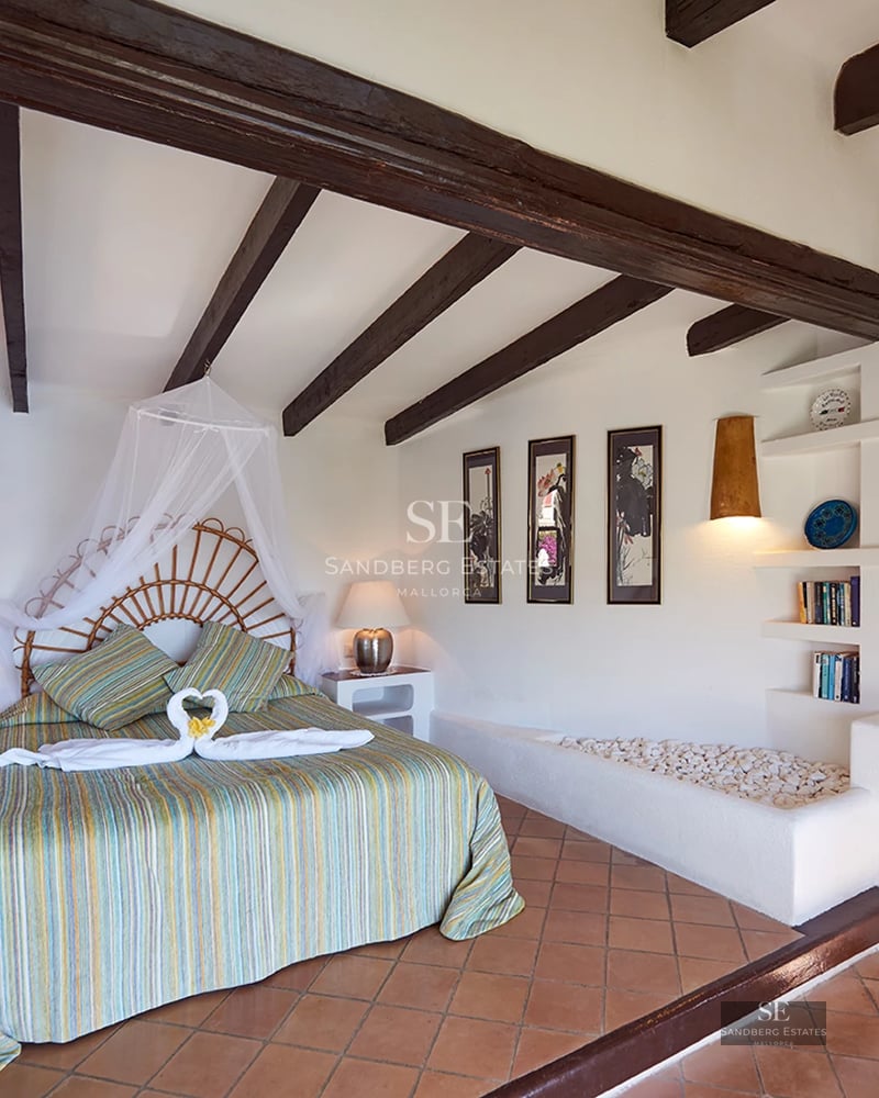 Aerial view of modern property with turquoise pool, landscaped garden and vast terraces. Sleek and minimalist architecture.