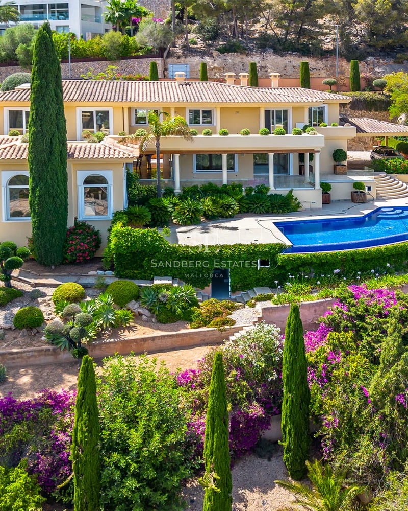 Spacious living room with floor-to-ceiling windows, infinity pool, and panoramic views. Modern design with high-quality finishes and natural light.