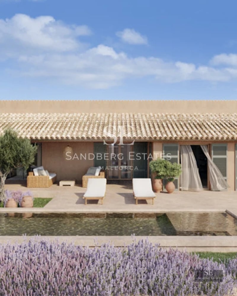 Expansive infinity pool bordered by lawn, and a modern villa with large windows. Warm ambient lighting and sleek architectural details.