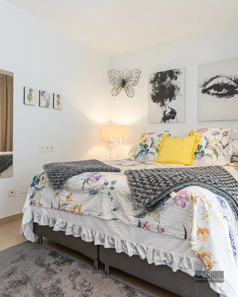 Spacious terrace with infinity pool and sea views. Modern design with stylish outdoor furniture. Warm ambient lighting.