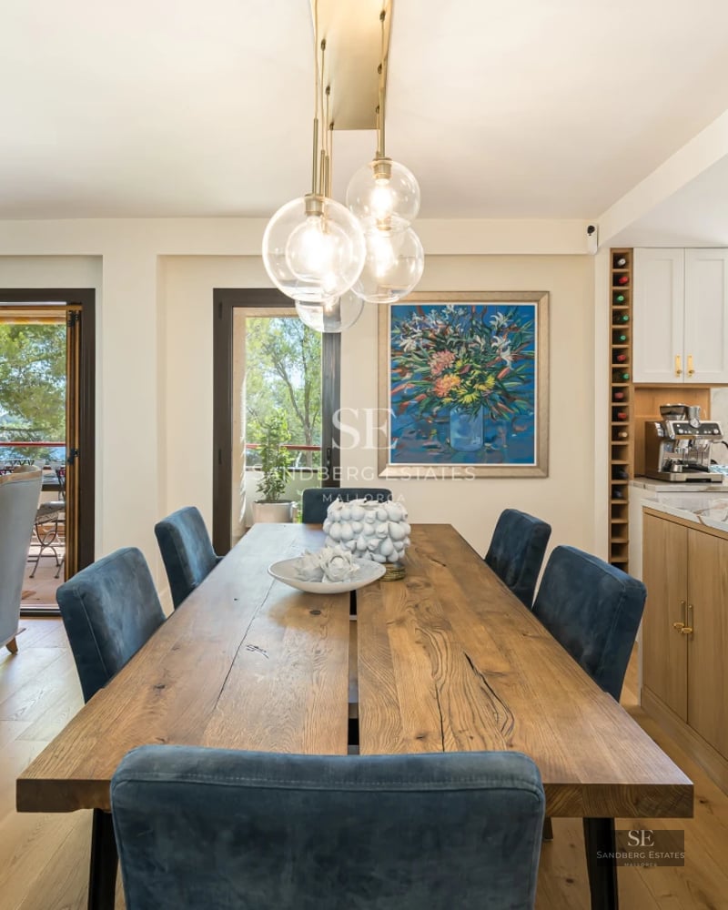 Spacious terrace with infinity pool, sun loungers, panoramic view, and modern architecture. Luxurious outdoor spaces for relaxation.