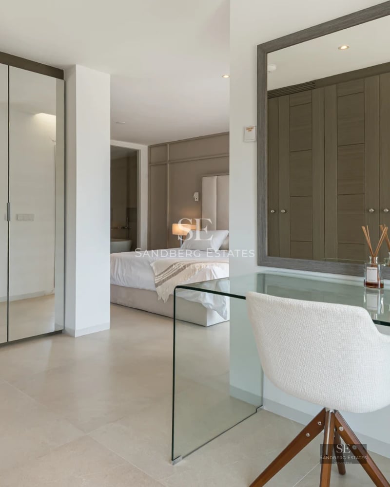 Modern villa with pool. Minimalist facade, large windows, spacious terrace, shimmering pool and manicured garden. Contemporary design.