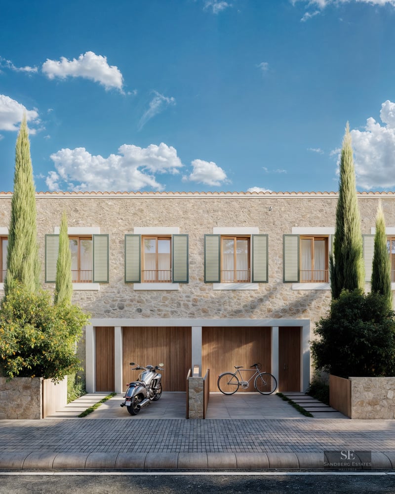 Elegant stone villa facade featuring wooden shutters, tall cypress trees, and luxury vehicles parked in front.