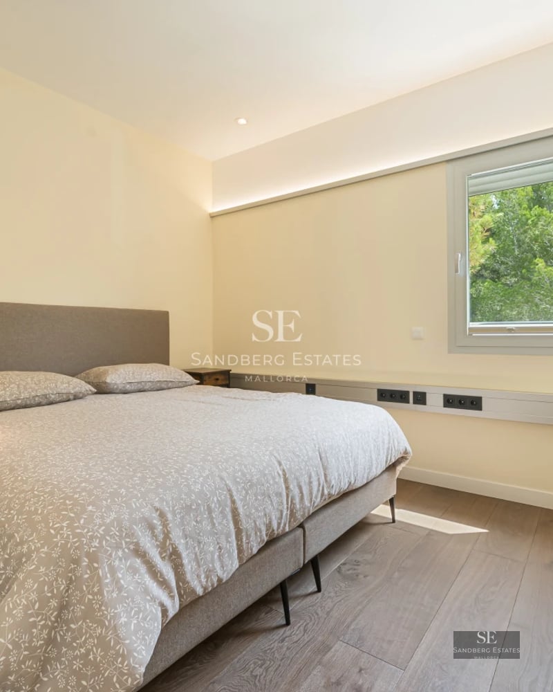 Expansive terrace with infinity pool. Panoramic views. Modern furniture. Soft ambient lighting. High-quality finishes.