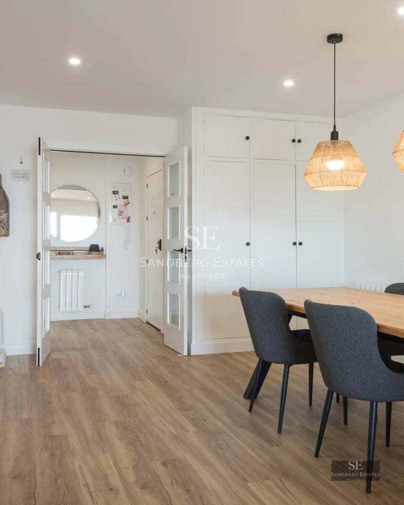 View of infinity pool, lush garden, and modern villa facade. Minimalist architecture, luxury finishes. Natural lighting.