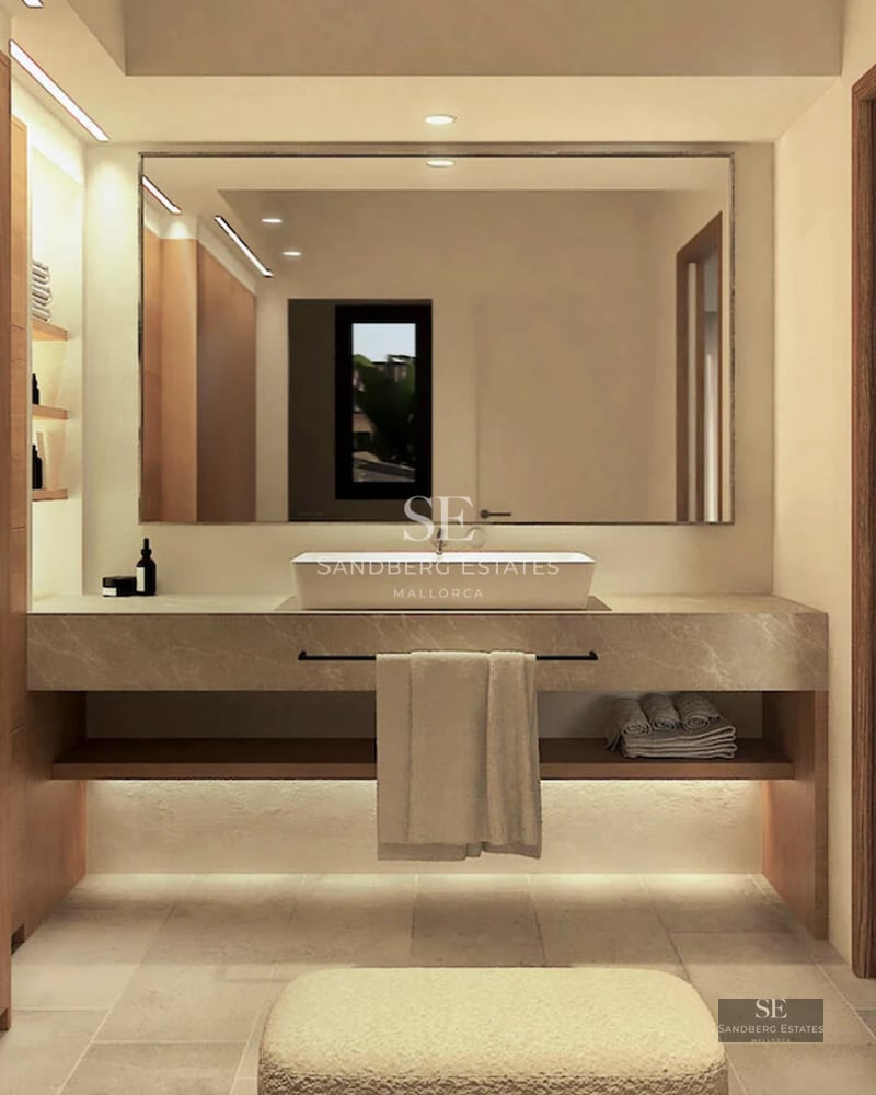 Spacious living room featuring large windows, reflective pool, and modern furniture. Wood details and abundant natural light.