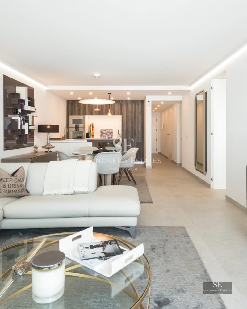 Modern villa featuring a pool, lush garden, and expansive living areas. Contemporary design, abundant natural light.