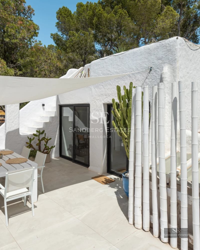 Spacious terrace with infinity pool and panoramic views. Modern design, natural lighting, and elegant outdoor furniture.