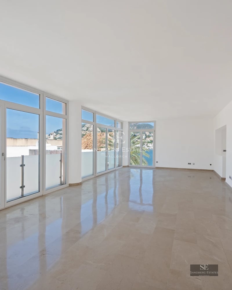 Aerial view of modern villa with turquoise pool surrounded by lush garden and minimalist architecture. Expansive terrace.