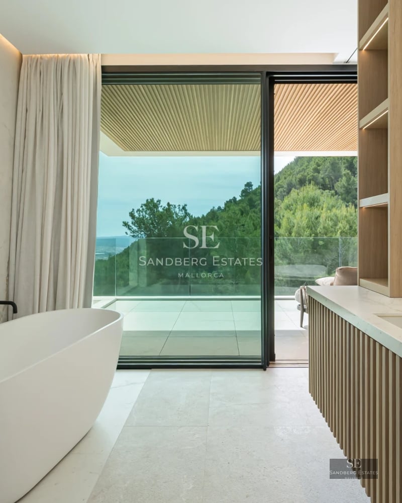 Spacious terrace with infinity pool, lush garden, and panoramic views. Modern design, elegant furniture, and abundant natural light.