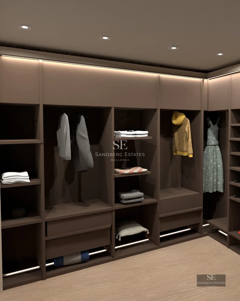 Spacious living room with panoramic sea views. Modern design, gray sofas, glass coffee table, and light wood flooring.