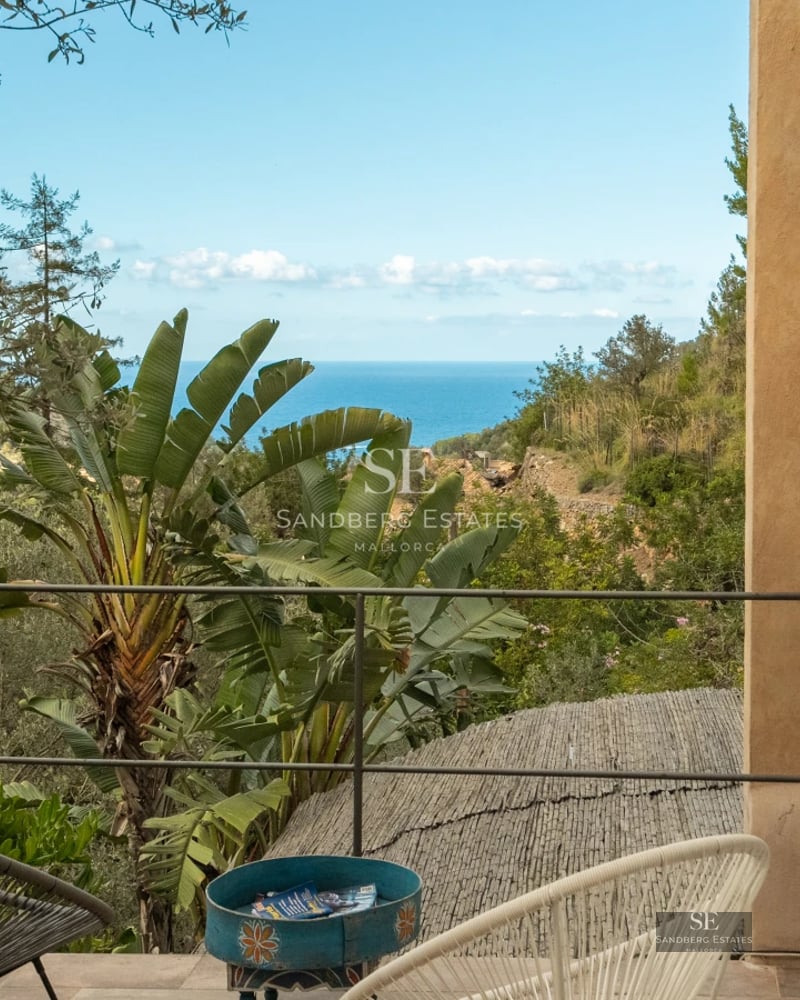 Modern penthouse featuring a spacious terrace, glass railing, and panoramic views. Minimalist design, natural lighting, and elegant furniture.