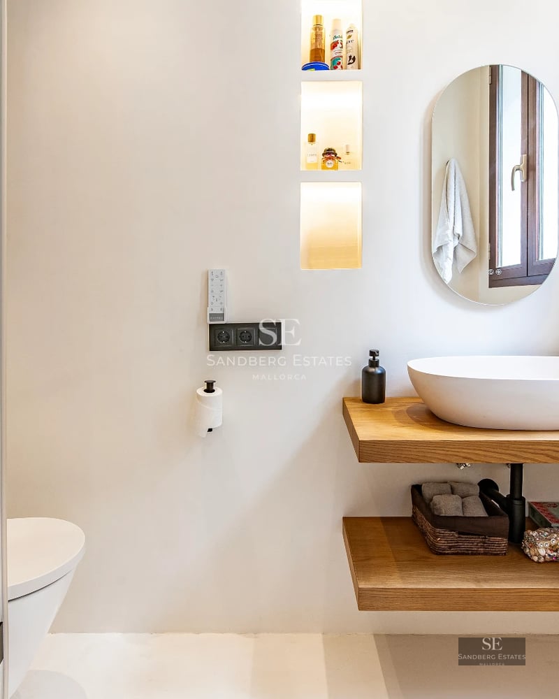 View of a modern villa with a pool. Sleek design, clean lines, and large windows. Natural lighting and lush landscaping.