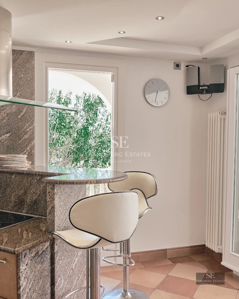 Exterior view of modern villa with pool. Minimalist design, large windows, lush gardens. Ideal for families.