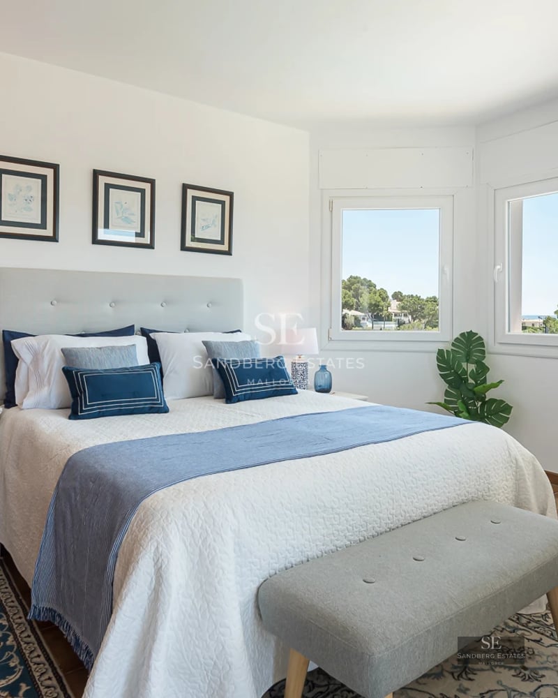 Exterior view of a luxurious house with a pool, manicured garden, and modern architecture. Elegant design with high-quality materials.