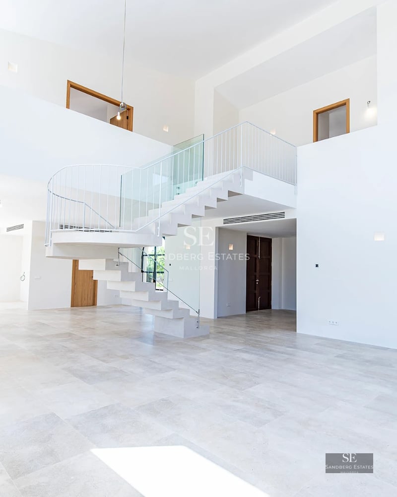 Exterior view of modern villa with infinity pool, lush garden, and expansive terraces. Minimalist architectural design.