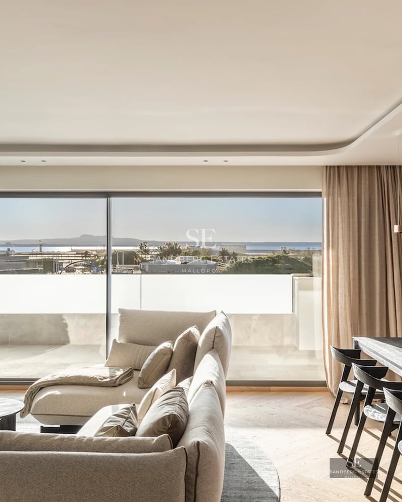 View of an infinity pool with modern design. Lush garden and minimalist architecture. Ideal for relaxation and luxury enjoyment.