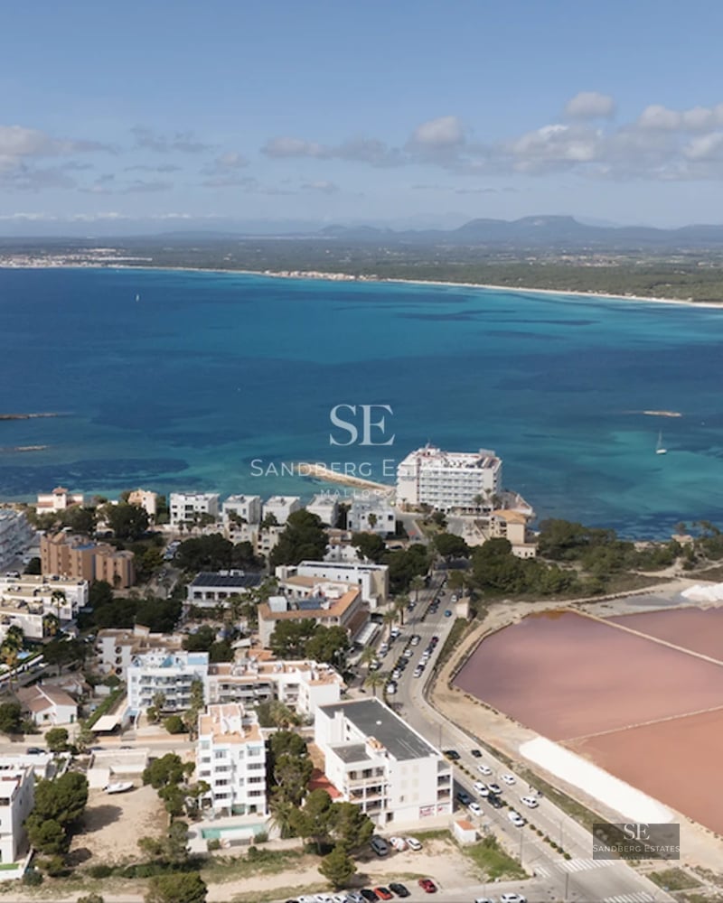 Spacious terrace with pool, sun loungers, and sea views. Modern and elegant design with high-quality materials.