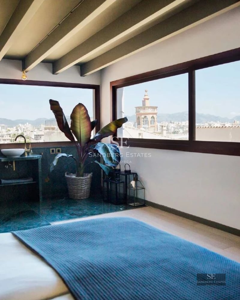 Panoramic view of a modern home with a turquoise pool, lush garden, and minimalist architecture. Large panoramic windows.