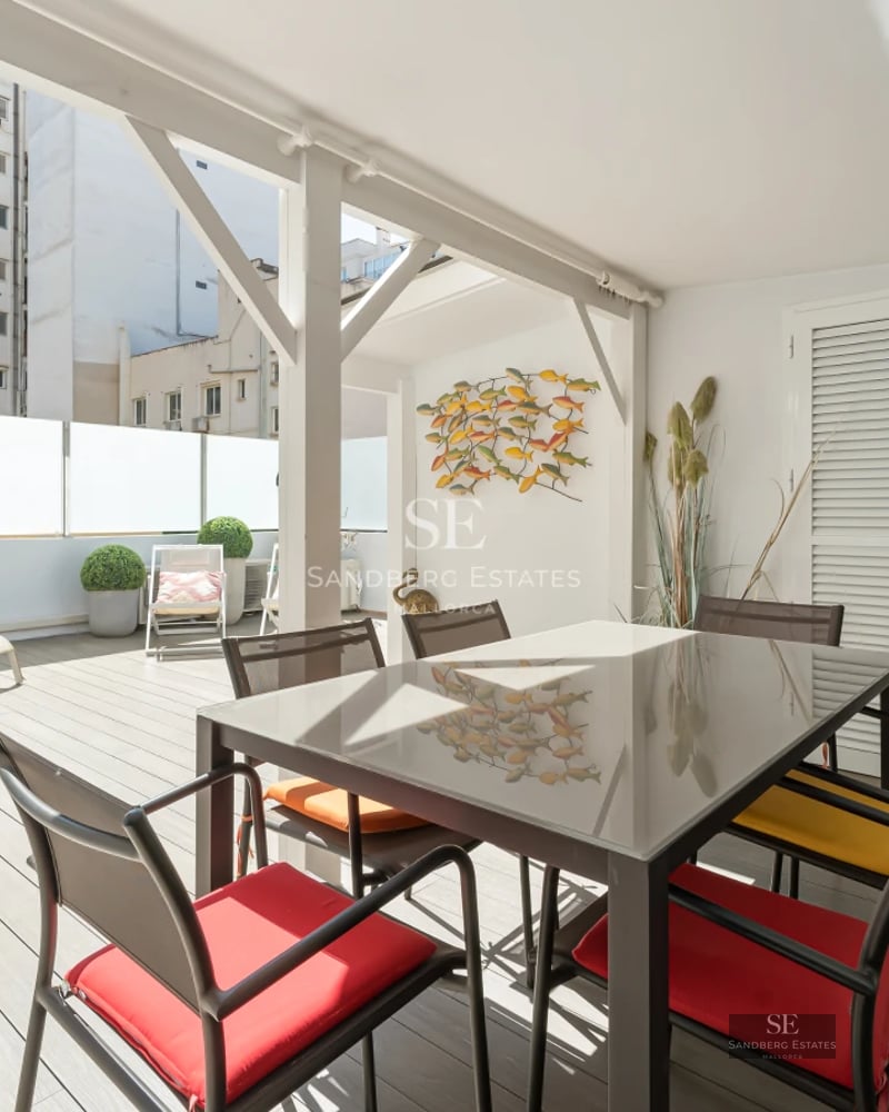 Spacious living room with floor-to-ceiling windows, infinity pool, and panoramic views. Modern design, elegant furniture, and natural light.