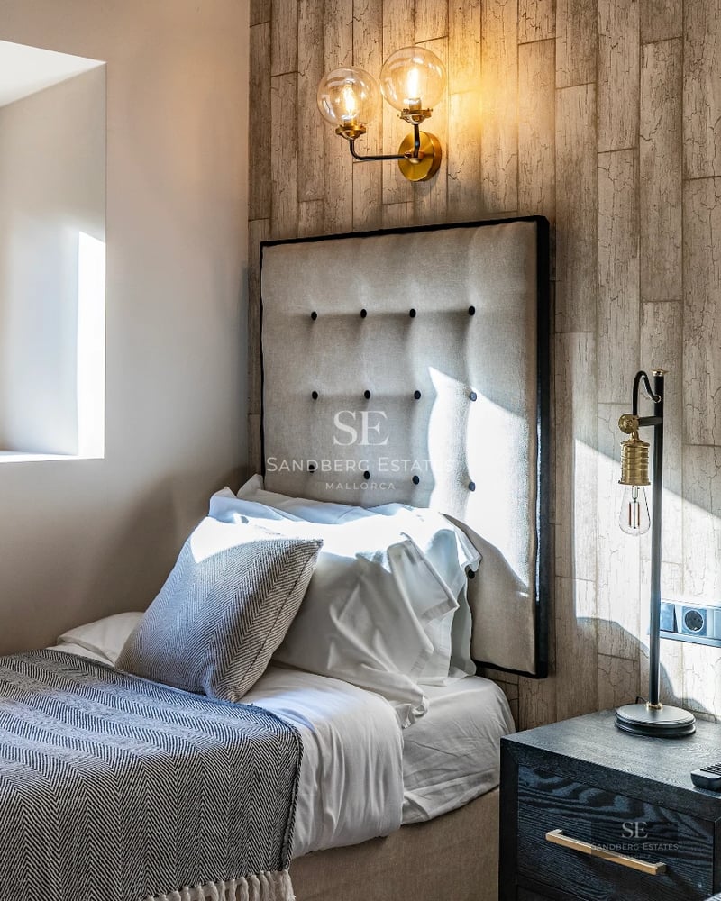 Modern exterior featuring reflecting pool, expansive windows, and minimalist landscaping. Soft ambient lighting.