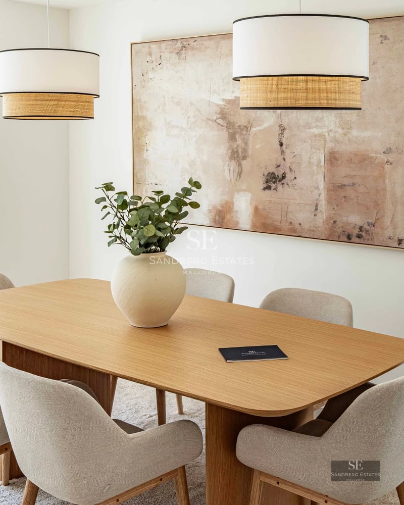 View of a luxurious villa with infinity pool, lush garden, and modern architecture. Ideal for relaxation and outdoor entertainment.