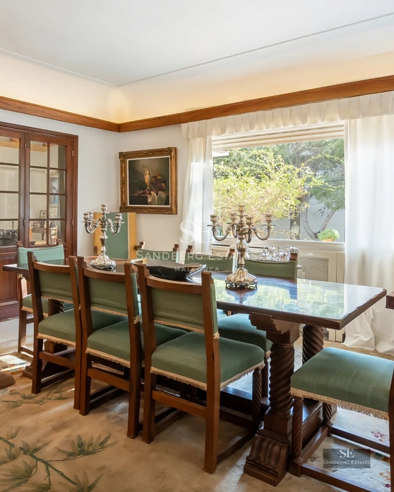 Aerial view of modern villa with infinity pool, lush garden, and expansive terraces. Minimalist architecture, elegant design, and natural light.