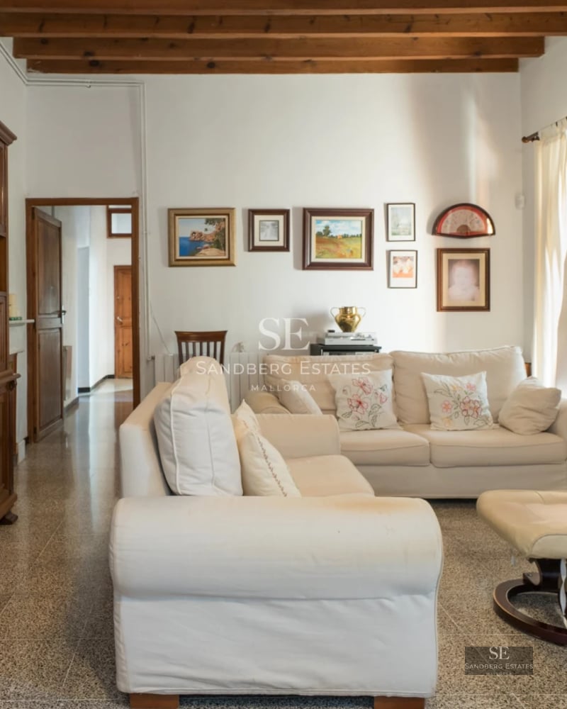 Exterior view of a modern villa with pool, garden, and large windows. Minimalist architecture and luxurious finishes.