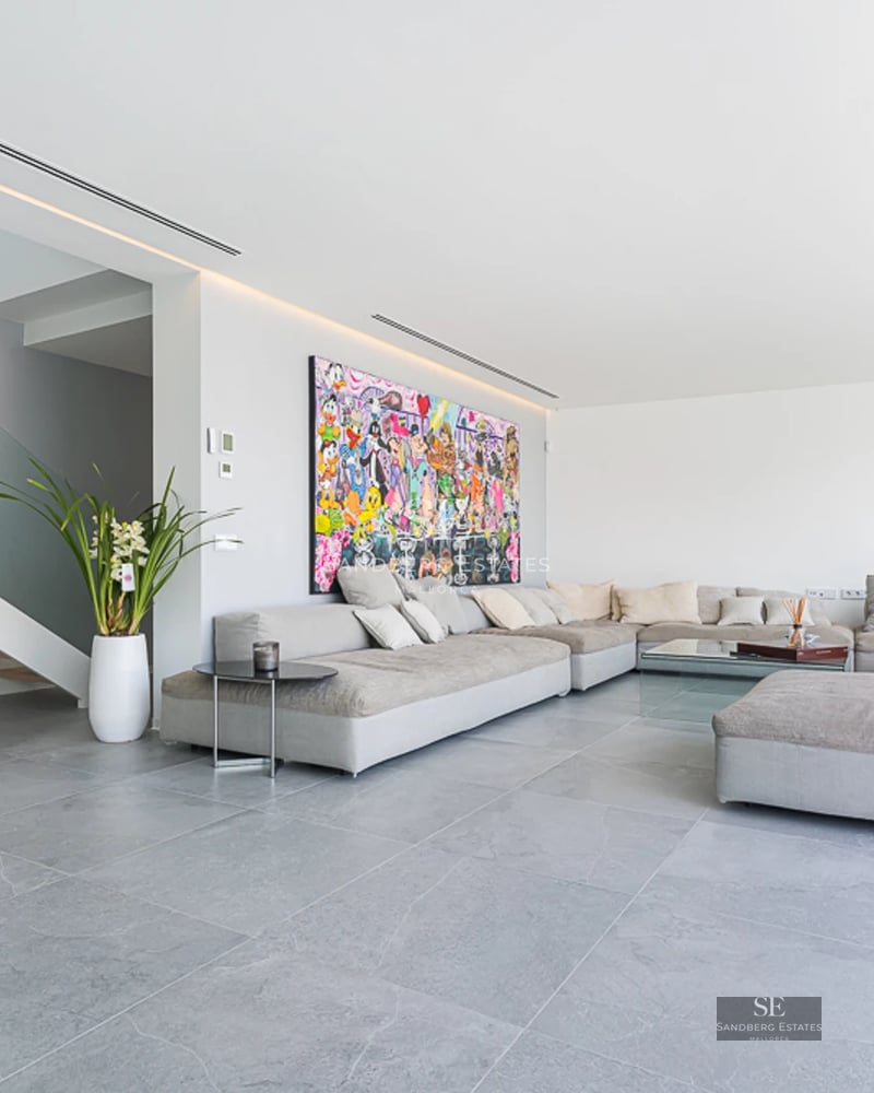 Spacious balcony with ocean view. Outdoor sofas, coffee table, modern and stylish design. Relaxation with unmatched panoramic views.