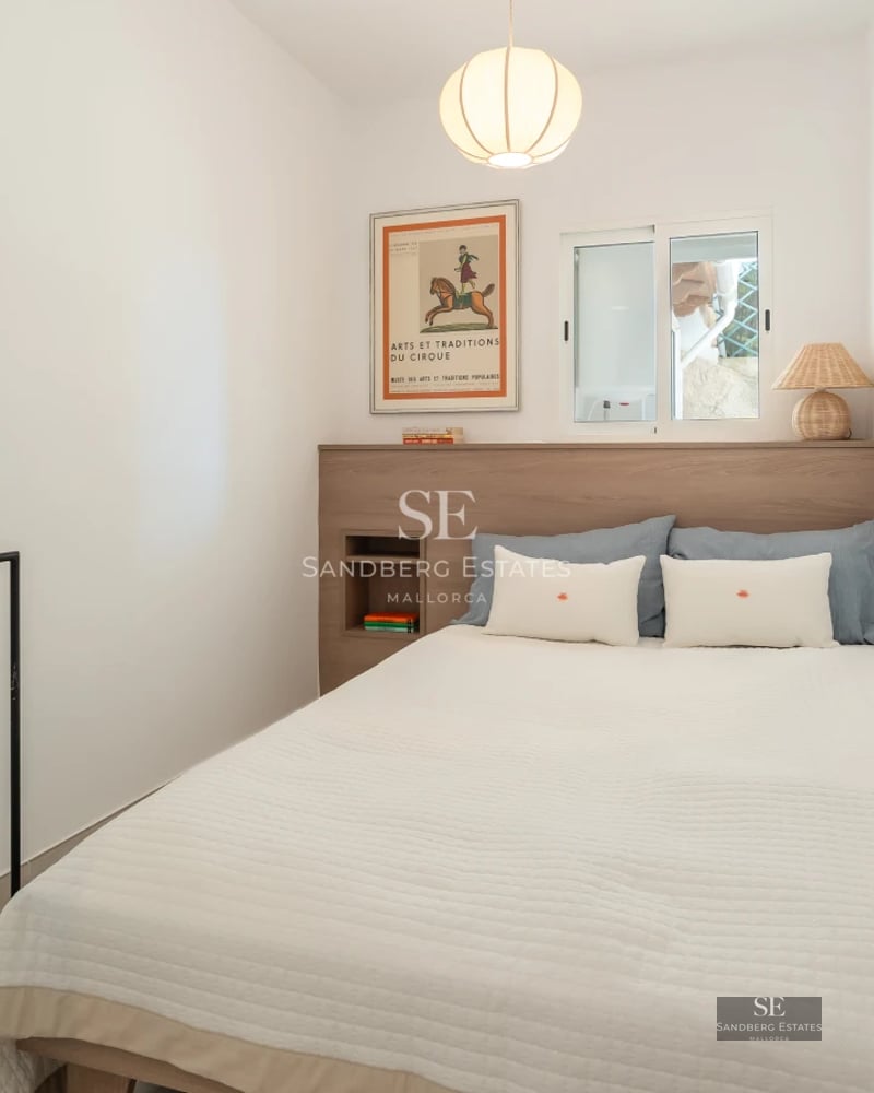 Spacious living room with panoramic windows and sea views. Modern, elegant, and bright design with high-end furniture.