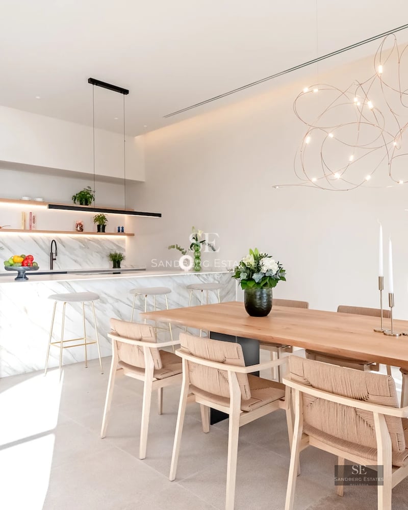 Exterior view of a modern villa with pool. Minimalist architecture, large windows, blue pool, and lush garden.
