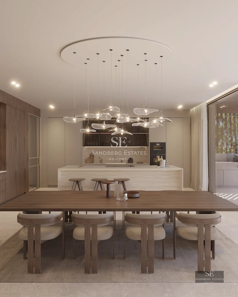 View of infinity pool with vanishing edge and modern home featuring large windows and decked patio with designer furniture. Lush garden.