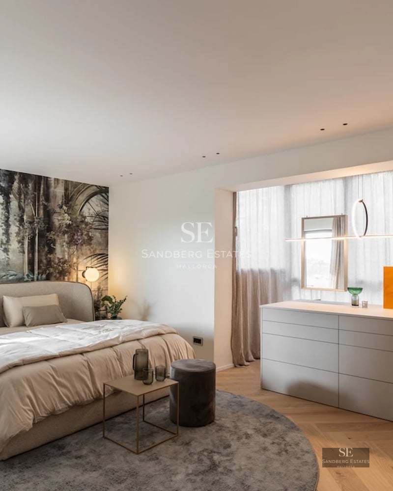 Spacious terrace with pool, sun loungers and views of greenery. Modern architecture with large windows and minimalist design.