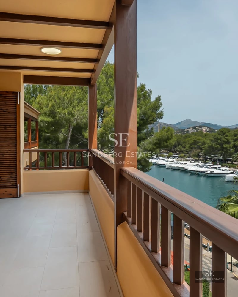 Exterior of a modern home with a pool, terrace, and large windows. Sleek design with high-quality finishes.