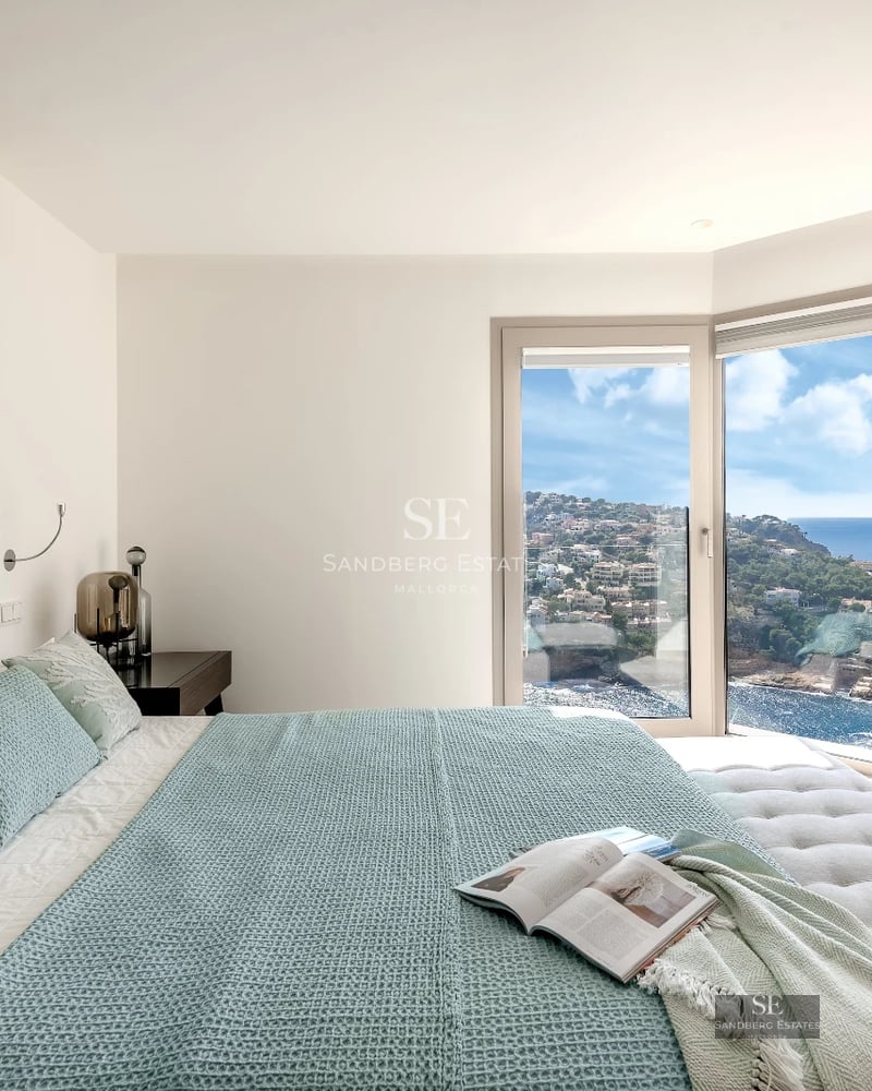 Expansive terrace with pool, sun loungers, and panoramic views. Modern design with stylish outdoor furniture and manicured landscaping.