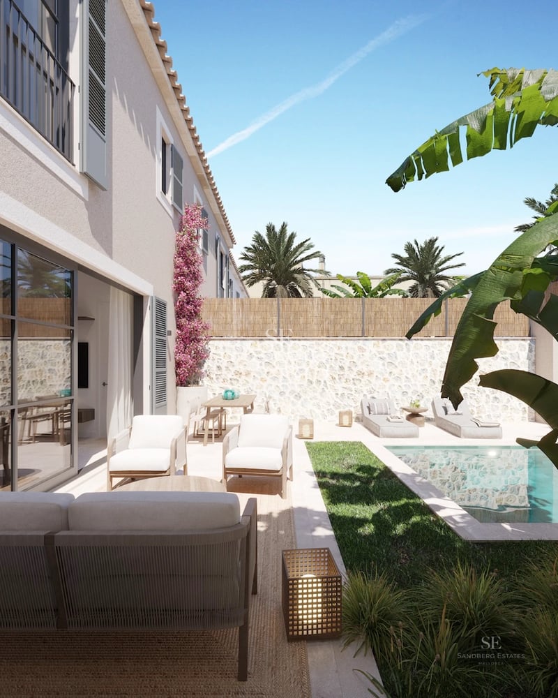 Spacious terrace with infinity pool and panoramic views. Modern architecture, elegant sun loungers and lush vegetation.