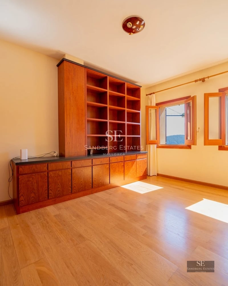 Exterior view of a modern villa with a pool, lush garden, and expansive outdoor living areas. Minimalist architecture and abundant natural light.